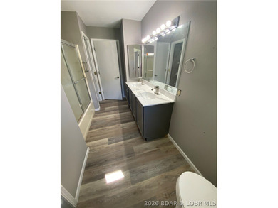 This home checks a lot of boxes: Location, blacktop to your door - photo 27