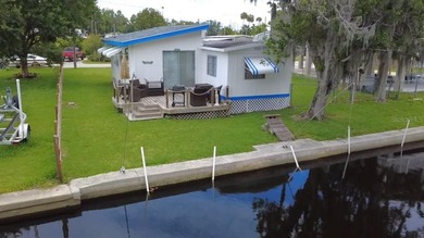 Turnkey waterfront property offering direct canal access to the - photo 31