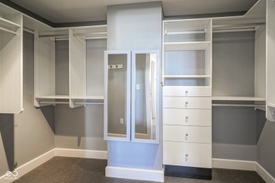 Welcome to luxury living in the heart of downtown Carmel! This