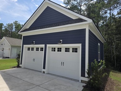 Welcome to this stunning Craftsman-inspired home in the highly - photo 49
