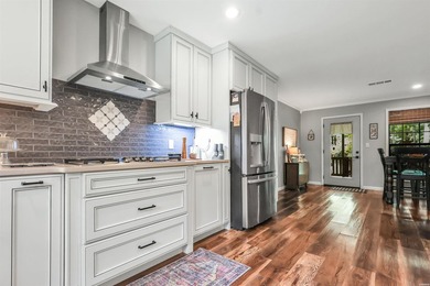 Built in 2022 and tucked away on 4.87+/- secluded acres, this - photo 14