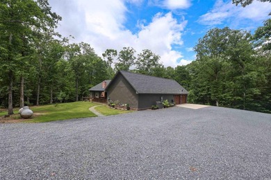 Built in 2022 and tucked away on 4.87+/- secluded acres, this - photo 34