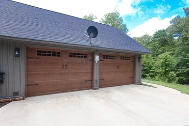 Built in 2022 and tucked away on 4.87+/- secluded acres, this - photo 36