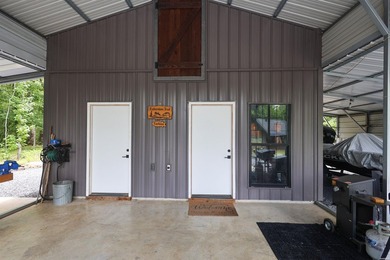 Built in 2022 and tucked away on 4.87+/- secluded acres, this - photo 38
