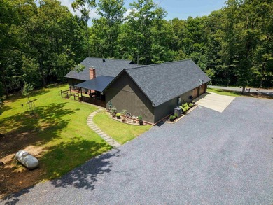 Built in 2022 and tucked away on 4.87+/- secluded acres, this - photo 44