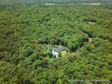 Built in 2022 and tucked away on 4.87+/- secluded acres, this - photo 50