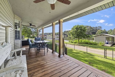 Experience lakeside living with two waterfront lots in the quiet - photo 3