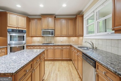 You will love this 6-bedroom home with the primary suite on the - photo 17