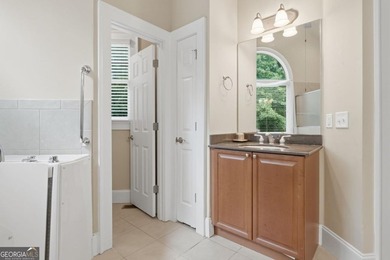 You will love this 6-bedroom home with the primary suite on the - photo 29