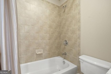 You will love this 6-bedroom home with the primary suite on the - photo 34