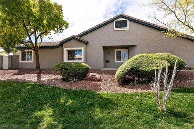 Beautiful single-story end-unit townhome located in a gated