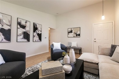 Beautiful single-story end-unit townhome located in a gated