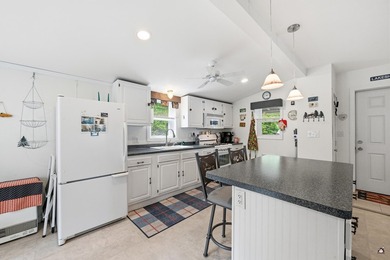 Experience the best of Maine lakefront living on beautiful - photo 8