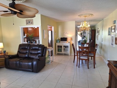 Enjoy peaceful lake views from this charming second-floor pet - photo 2