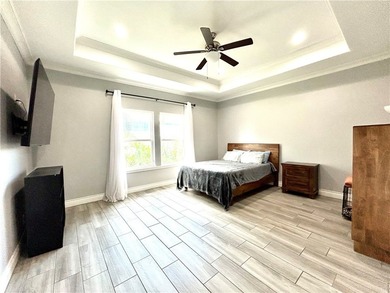 Nestled back in a private, gated community, this well taken care - photo 13