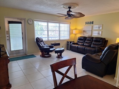 Enjoy peaceful lake views from this charming second-floor pet - photo 10