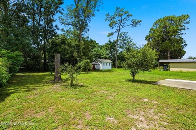 Welcome to this beautifully maintained 4-bedroom, 2-bath home in - photo 38