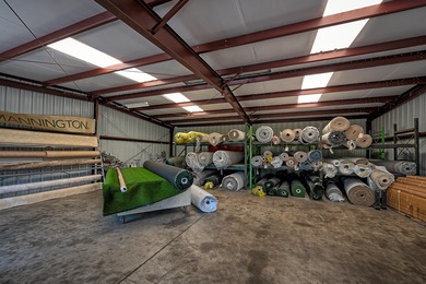 Lot is 30,928 sq ft with 3 buildings. The main building is a two - photo 11