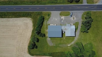 Situated just outside of town, this unique commercial property