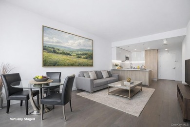 Welcome to Grand One at Sky View Parc. This mint one-bedroom