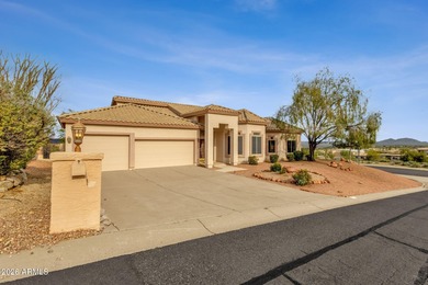 Set on a quiet street with sweeping views of Four Peaks and Red