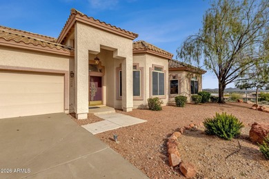 Set on a quiet street with sweeping views of Four Peaks and Red