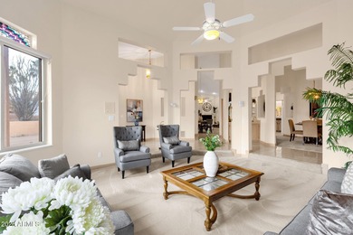 Set on a quiet street with sweeping views of Four Peaks and Red