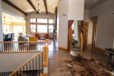 Perched to capture breathtaking mountain views in the - photo 5