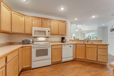 Priced below assessed value! Welcome to this well-maintained - photo 12
