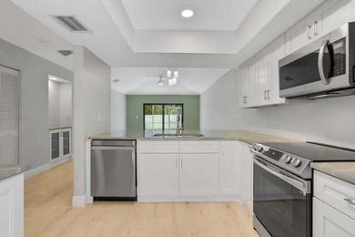 Make this beautifully remodeled 2-bedroom, 2-bath villa in - photo 6
