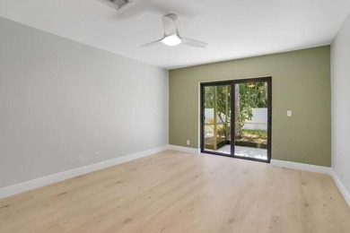 Make this beautifully remodeled 2-bedroom, 2-bath villa in - photo 10