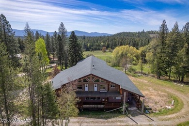 Tucked away in a private, park-like setting in North Idaho, this - photo 8