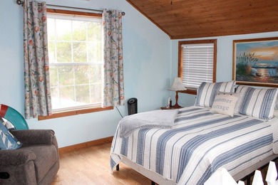 Escape to your own charming lake retreat featuring a classic - photo 9