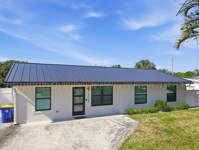 Fully remodeled in 2023, this Jupiter home feels like new - photo 2