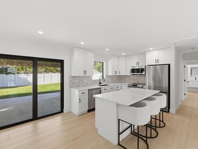 Fully remodeled in 2023, this Jupiter home feels like new - photo 10