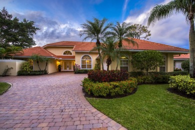 Lake Home For Sale in Palm Beach Gardens, Florida