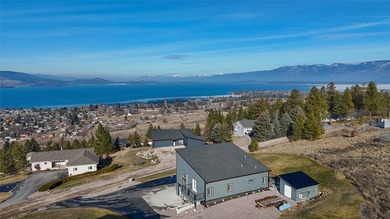 Set high on Skyline Drive above Polson, this 2 bedroom 2 - photo 3