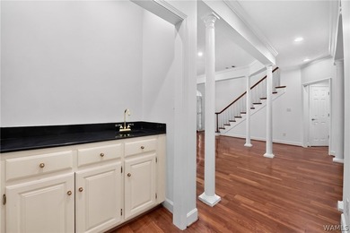 Nestled on a wooded golf course lot in the sought-after - photo 13