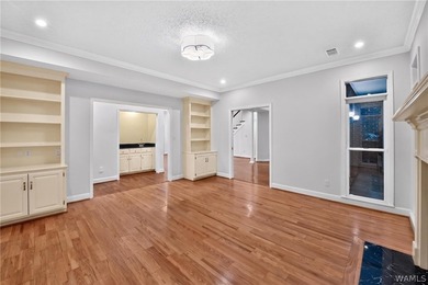 Nestled on a wooded golf course lot in the sought-after - photo 18