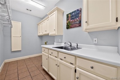Nestled on a wooded golf course lot in the sought-after - photo 28