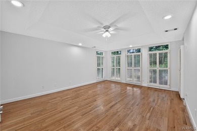 Nestled on a wooded golf course lot in the sought-after - photo 29