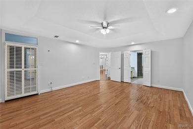 Nestled on a wooded golf course lot in the sought-after - photo 30