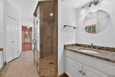 Nestled on a wooded golf course lot in the sought-after - photo 33