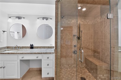 Nestled on a wooded golf course lot in the sought-after - photo 35