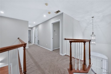 Nestled on a wooded golf course lot in the sought-after - photo 36