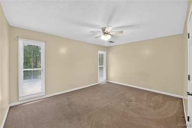 Nestled on a wooded golf course lot in the sought-after - photo 39