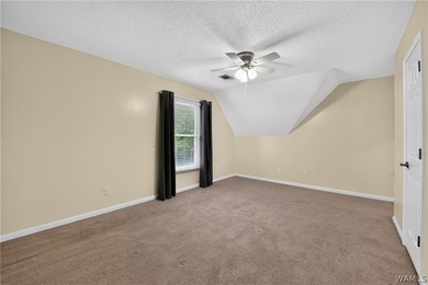 Nestled on a wooded golf course lot in the sought-after - photo 41