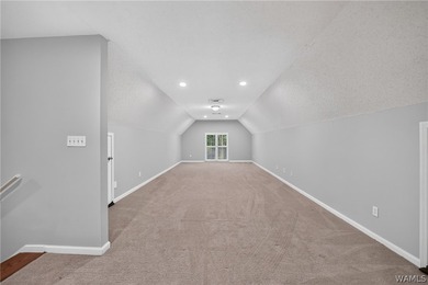 Nestled on a wooded golf course lot in the sought-after - photo 44