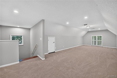 Nestled on a wooded golf course lot in the sought-after - photo 45