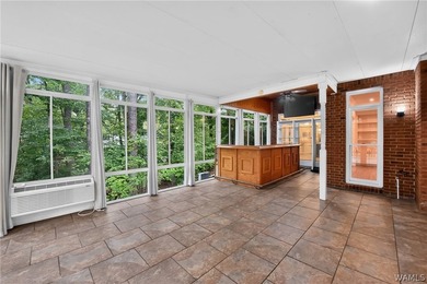 Nestled on a wooded golf course lot in the sought-after - photo 47